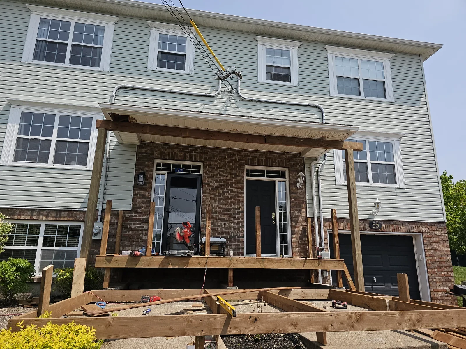 Townhome front entry before the new deck was built
